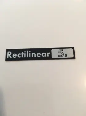 106T8 RECTILINEAR Grill Cover Name Badge Emblem